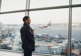 Silhouette of man waiting for the flight