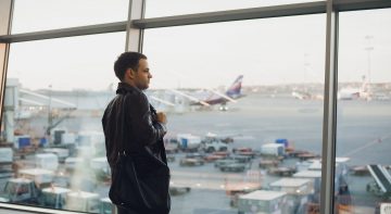 Silhouette of man waiting for the flight